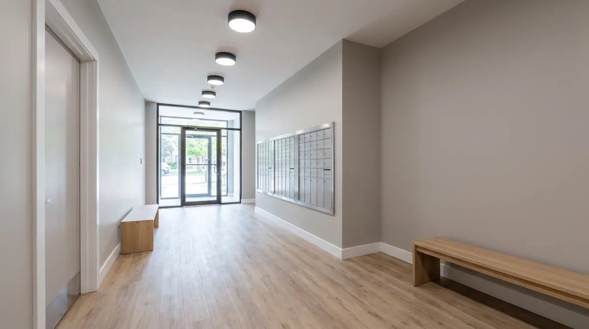 Illustration of a freshly refinished apartment lobby with new floor, paint and lights